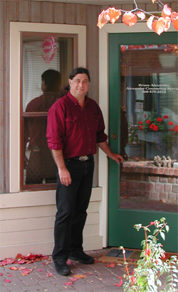 Bruce Alexander at the door to Alexander Counseling Services